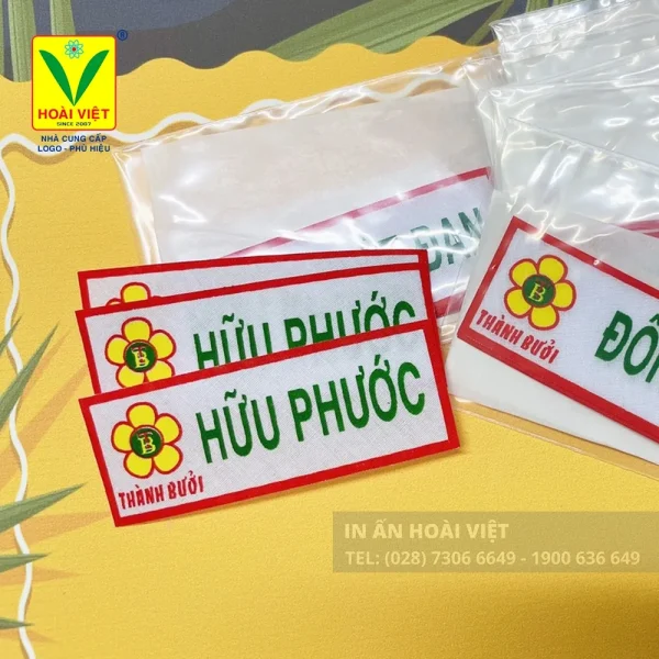 Nhãn tên vải ủi cho công ty – Lựa chọn tối ưu cho đồng phục doanh nghiệp hiện đại